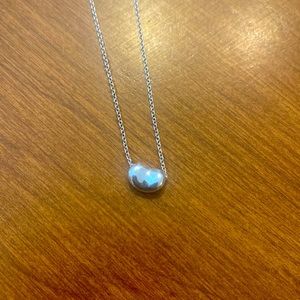 Tiffany “Elsa Peretti” Bean necklace. Sterling silver 9mm on a 16in. Chain.